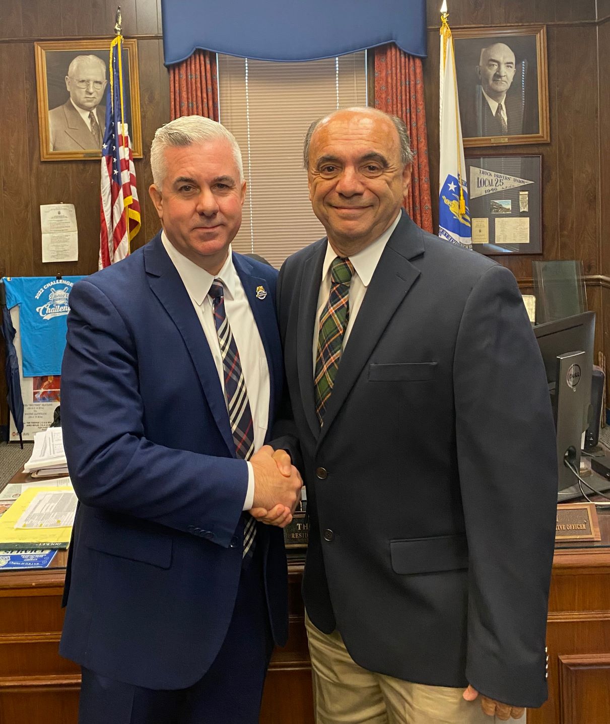 Teamsters Local 25 President Thomas G. Mari shaking hands with Revere school committed candidate Anthony Caggiano